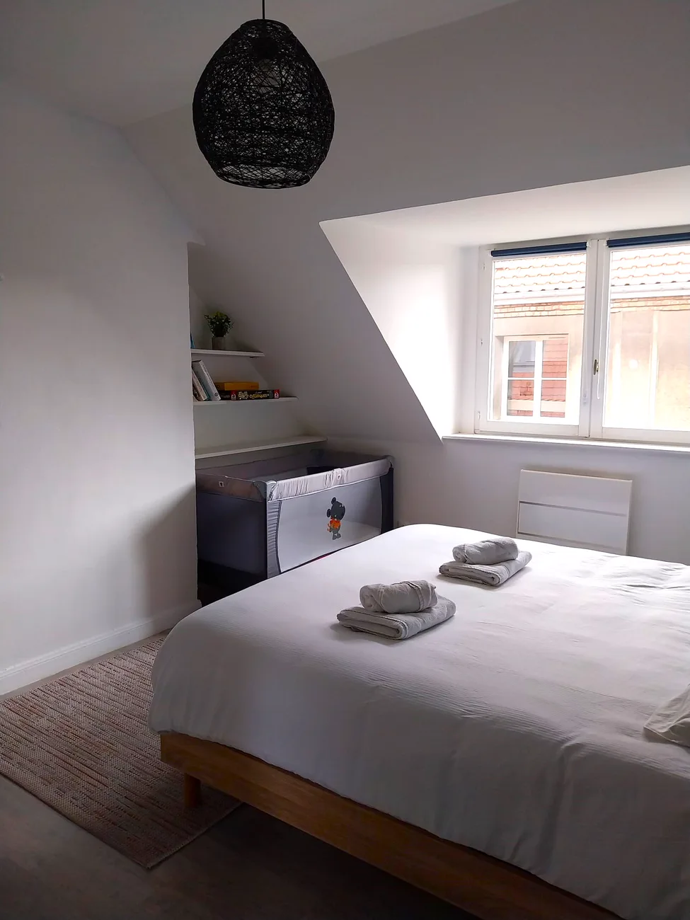 Master bedroom with baby crib